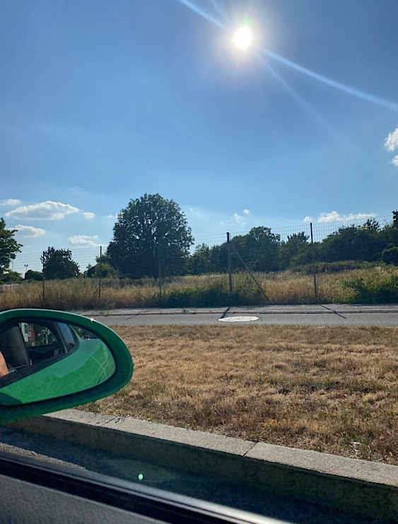 Foto aus dem Auto gegen die Sonne fotografiert 1